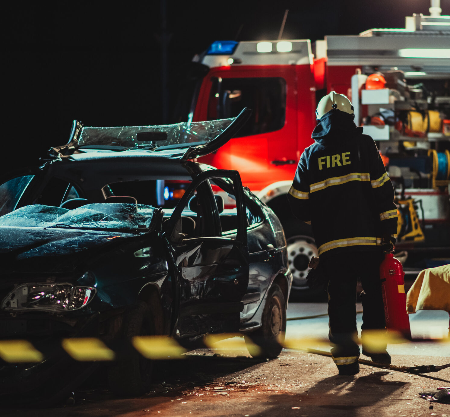 Firefighters At A Car Accident Scene